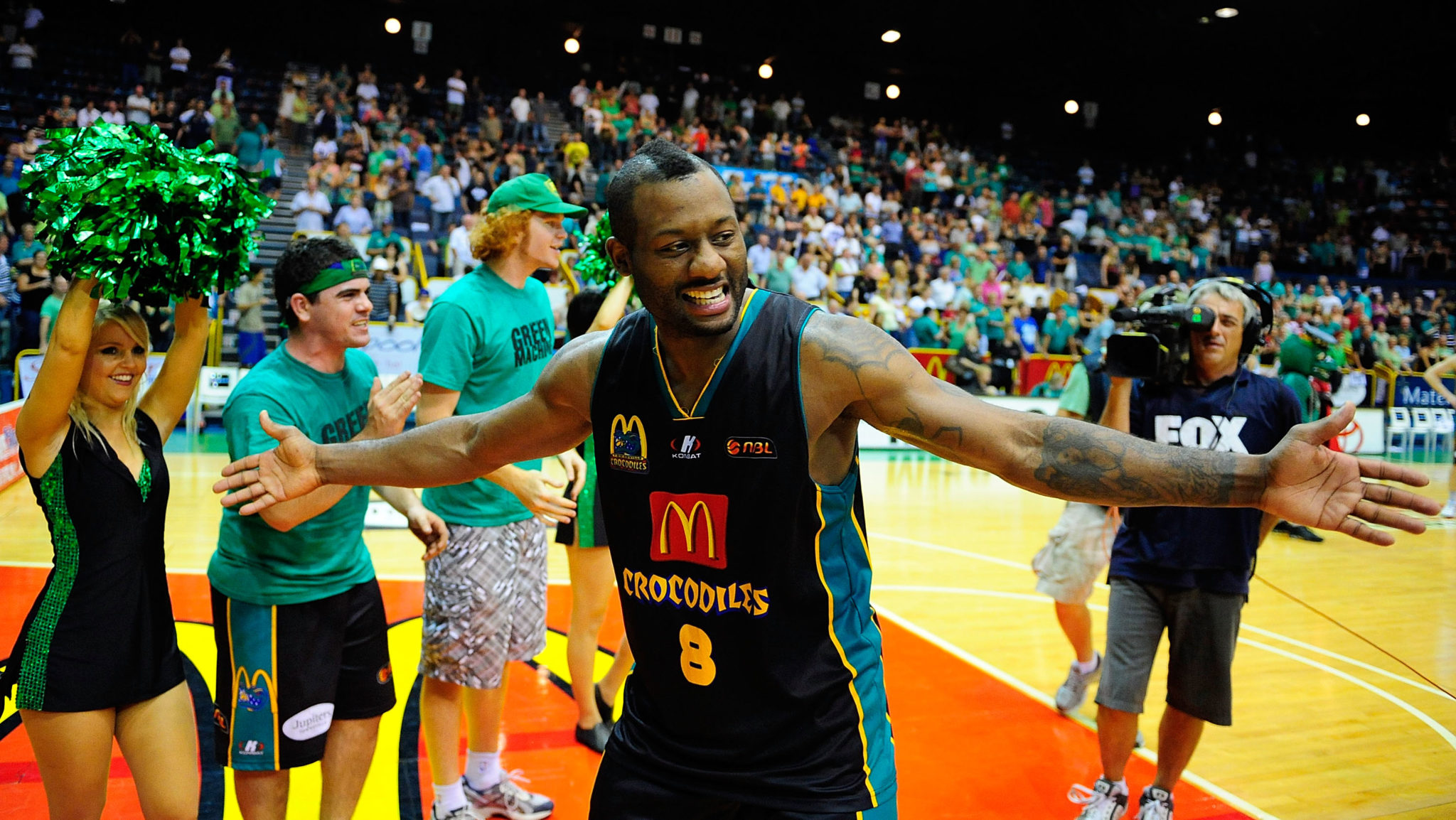 TOWNSVILLE, AUSTRALIA - FEBRUARY 24:  Corey Williams of the Crocodiles acknowledges the crowd after winning  game two of the NBL semi final series between the Townsville Crocodiles and the Wollongong Hawks at the Townsville Entertainment Centre on February 24, 2010 in Townsville, Australia.  (Photo by Ian Hitchcock/Getty Images)